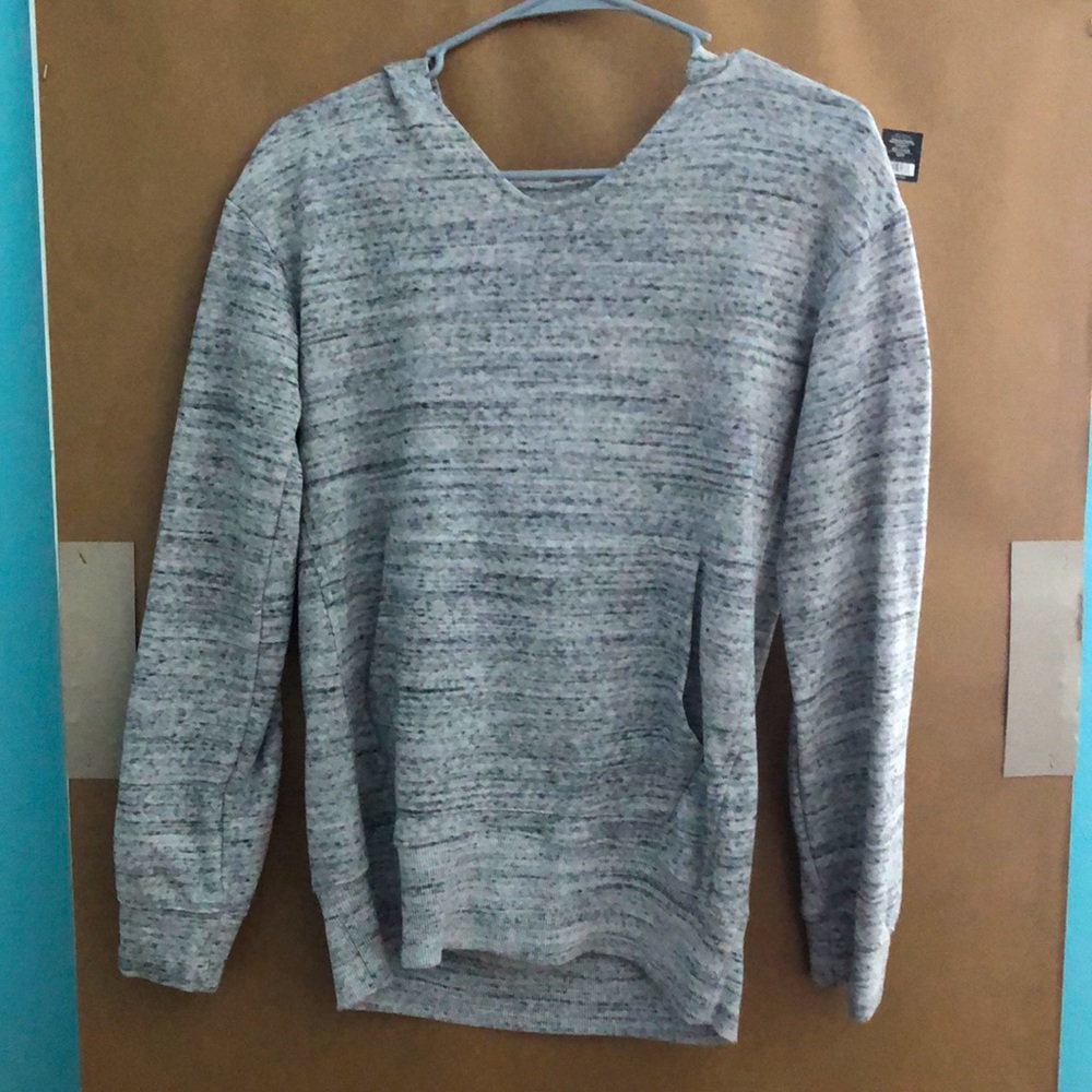 thinner sweatshirt, soft on the inside it was never worn but I took the tags of
